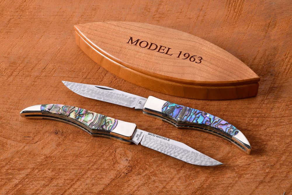 Model 1963 with pearl handles in a wild cherry wood box. 